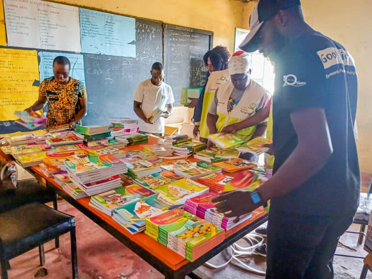 School exercise books and stationery prepared for distribution