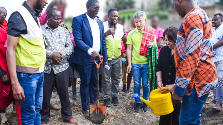 Community members collecting clean water at a new water point